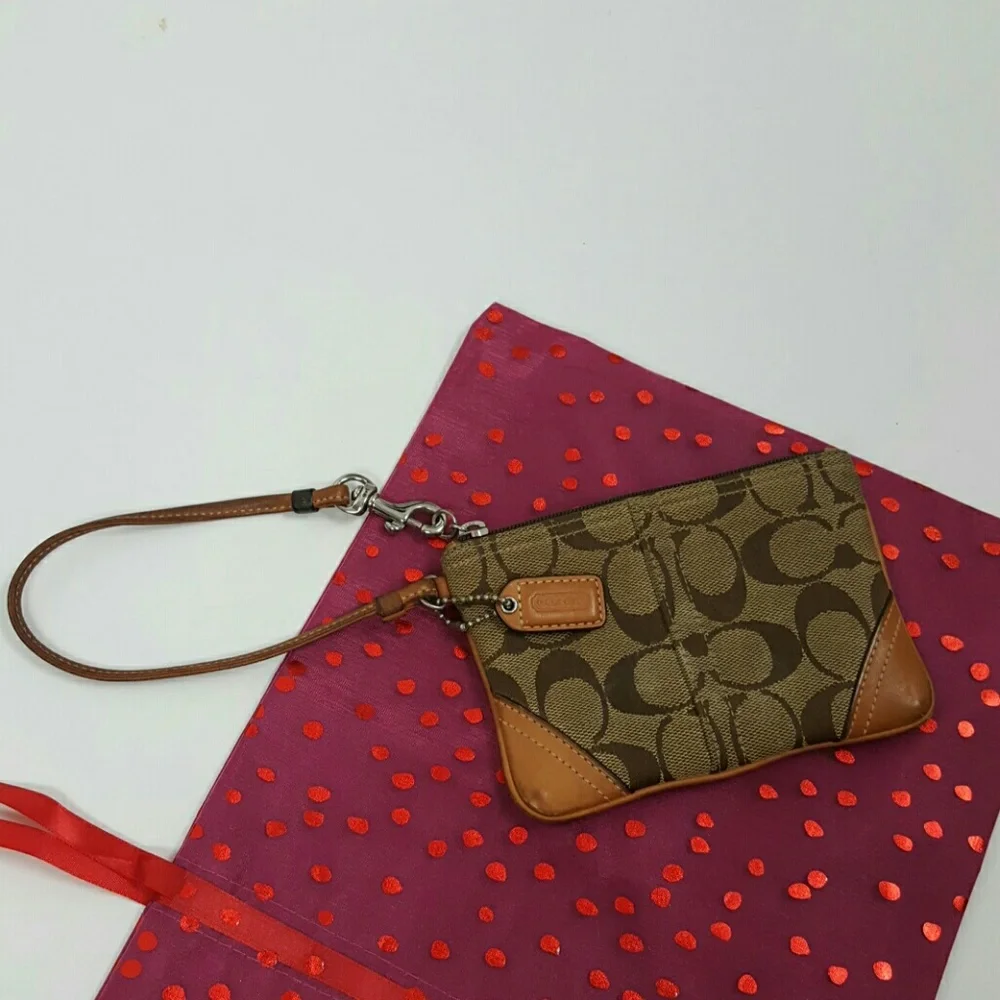 Coach brown canvas wristlet